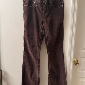 London Jeans brown corduroy boot leg with flap back pockets.